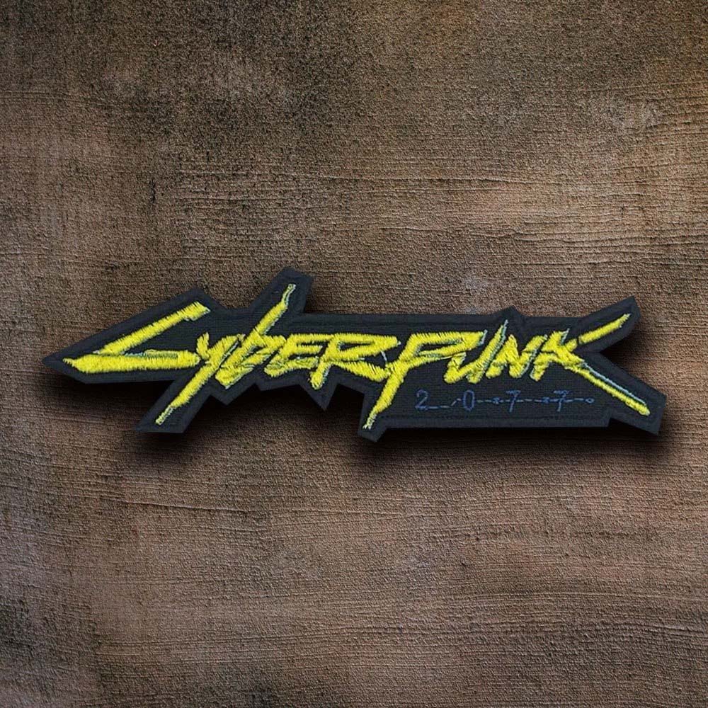 Vibrant Cyberpunk 2077 Yellow Logo Patch with multiple backing options.