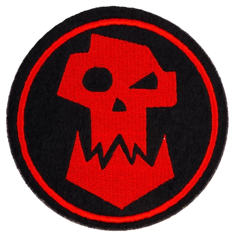 Embroidered patch featuring a red orc skull on a black background