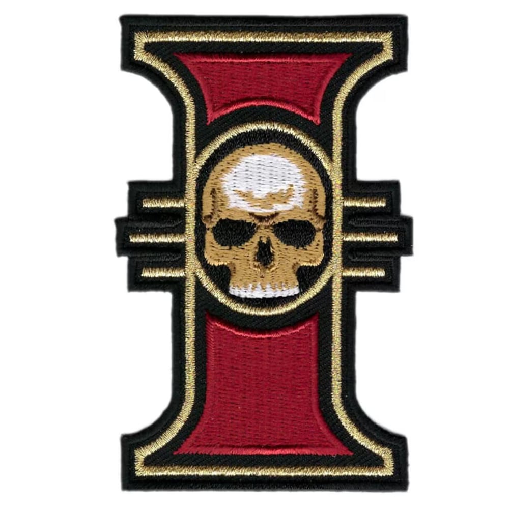 Embroidered patch featuring a skull centered on a red and gold cross