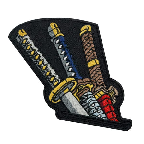 Embroidered patch featuring three samurai katanas in vibrant colors on a black background.