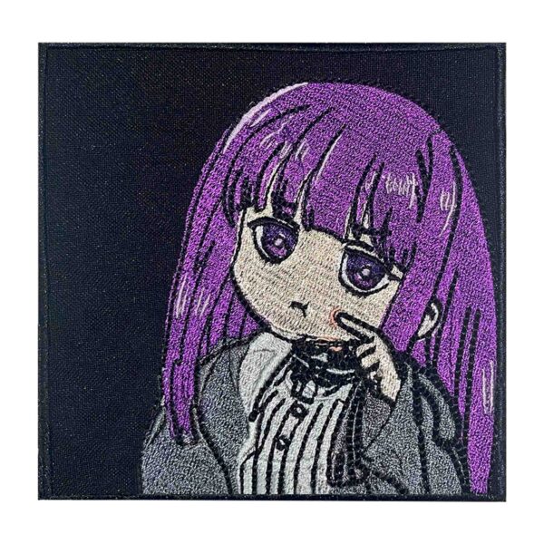 Embroidered patch featuring Fern from Frieren: Beyond Journey’s in a chibi-style design. The patch showcases Fern with purple hair, wearing a black and white outfit, and touching her cheek with a curious expression. Perfect for anime fans, cosplay, and collectors.