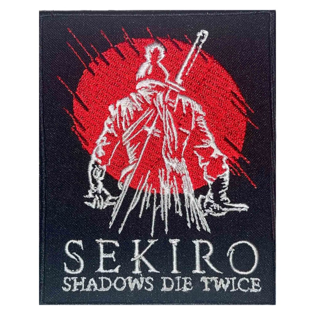 Embroidered Sekiro Shadows Die Twice patch featuring the Wolf shinobi in front of a red moon, inspired by FromSoftware's Soulsborne game.